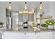 Stylish kitchen featuring granite countertops, stainless steel appliances, and modern pendant lighting at 1491 Greenshade Way, Mount Pleasant, SC 29464