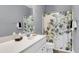Comfortable bathroom features a vanity with bright lighting, shower, and neutral colored walls at 1523 Nautical Chart Dr, Charleston, SC 29414