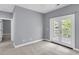 Spacious bedroom with an outside balcony view for optimal natural lighting at 1523 Nautical Chart Dr, Charleston, SC 29414