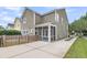 Home exterior with a screened-in porch and concrete patio at 1523 Nautical Chart Dr, Charleston, SC 29414