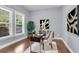 Bright home office featuring a modern desk, globe, and large window at 1523 Nautical Chart Dr, Charleston, SC 29414