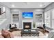 Cozy living room features a fireplace, built-in shelves, and comfortable seating at 1523 Nautical Chart Dr, Charleston, SC 29414