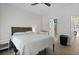 Cozy bedroom with a bed, a nightstand, and an attached bathroom at 1625 Teal Marsh Rd, Charleston, SC 29412