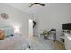 Well-lit bedroom featuring carpet, a ceiling fan, a comfortable bed, and a spacious interior at 1625 Teal Marsh Rd, Charleston, SC 29412