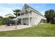 Charming coastal home featuring a spacious driveway, double garage, and a welcoming upper porch at 1625 Teal Marsh Rd, Charleston, SC 29412