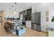Beautiful eat-in kitchen featuring a stylish island, stainless steel appliances, and custom backsplash at 1625 Teal Marsh Rd, Charleston, SC 29412