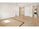 Hallway with hard wood flooring and a rug at 2064 Parish House Cir, Johns Island, SC 29455