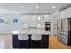 Elegant kitchen boasts an oversized island, stainless steel appliances, and stylish pendant lighting at 2064 Parish House Cir, Johns Island, SC 29455