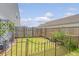 View of the backyard area with a garden, and fence at 209 Parkwood Vista Way, Summerville, SC 29486