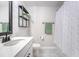 Bathroom featuring a tub and shower combination, white shower curtain and shiplap at 209 Parkwood Vista Way, Summerville, SC 29486