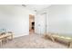 Bright bedroom featuring neutral carpet, and an open doorway to another room at 209 Parkwood Vista Way, Summerville, SC 29486