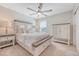 Comfortable bedroom with soft neutral tones, a ceiling fan, a window, and neutral furnishings at 209 Parkwood Vista Way, Summerville, SC 29486