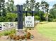 The Pine Crest community sign, with beautifully landscaped surroundings at 209 Parkwood Vista Way, Summerville, SC 29486