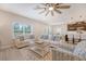 Open-concept living room with a view of the kitchen and dining area, perfect for entertaining at 209 Parkwood Vista Way, Summerville, SC 29486