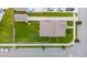 Aerial view of a home featuring a large backyard and a long driveway on a corner lot at 2267 Kemmerlin St, Johns Island, SC 29455