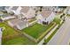 Aerial view of fenced backyard with green lawn and privacy, as well as view of the screen porch at 2267 Kemmerlin St, Johns Island, SC 29455