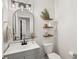 Modern bathroom with stylish fixtures, floating shelves, and neutral tones at 2267 Kemmerlin St, Johns Island, SC 29455