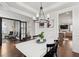 Elegant dining room with hardwood floors, modern chandelier, and inviting decor at 2267 Kemmerlin St, Johns Island, SC 29455