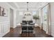 Bright dining room with coffered ceiling, large windows, and elegant lighting fixture at 2267 Kemmerlin St, Johns Island, SC 29455
