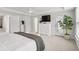 Spacious main bedroom with a TV, access to ensuite bathroom and a small balcony at 2267 Kemmerlin St, Johns Island, SC 29455