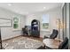 Bright home office featuring a computer, stylish decor, and two large windows at 2267 Kemmerlin St, Johns Island, SC 29455