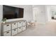 Spacious playroom with storage, small table, and TV on the wall at 2267 Kemmerlin St, Johns Island, SC 29455