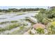 A gazebo and dock sit along the marshy waterfront at 250 Little Oak Island Dr, Folly Beach, SC 29439