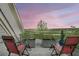 Relaxing balcony offers stunning sunset views over the marsh at 250 Little Oak Island Dr, Folly Beach, SC 29439