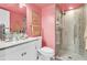 Modern bathroom featuring a glass bowl sink, marble countertop, and a glass enclosed shower with mosaic tile accents at 250 Little Oak Island Dr, Folly Beach, SC 29439