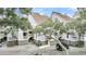 Well-maintained exterior showcasing updated landscaping and convenient parking at 250 Little Oak Island Dr, Folly Beach, SC 29439