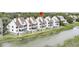 Marshfront townhouse complex with multiple screened porches at 250 Little Oak Island Dr, Folly Beach, SC 29439