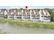 Waterfront property with multiple levels of decks and outdoor seating, providing ample space for relaxation and entertainment at 250 Little Oak Island Dr, Folly Beach, SC 29439