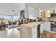 Open-concept kitchen with granite countertops, stainless steel appliances, and ample storage at 250 Little Oak Island Dr, Folly Beach, SC 29439