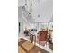 Bright living room features elegant decor, fireplace, and large windows with scenic views at 250 Little Oak Island Dr, Folly Beach, SC 29439