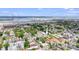 Aerial view of neighborhood featuring 29 Hanover St., trees, buildings, water, and a bridge at 29 Hanover St, Charleston, SC 29403