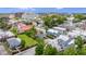 Aerial view showing a neighborhood with various houses and green spaces in a sunny environment at 29 Hanover St, Charleston, SC 29403