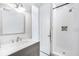 Bathroom with a shower, vanity and sink with natural light from a window at 29 Hanover St, Charleston, SC 29403