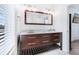 Bathroom featuring double vanity with marble countertop and wood cabinets and fixtures at 29 Hanover St, Charleston, SC 29403