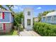 Unique narrow home with a quaint entrance and fresh landscaping in a charming neighborhood at 29 Hanover St, Charleston, SC 29403