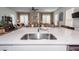 Bright kitchen featuring white countertops, stainless steel sink, and contemporary faucet at 290 Woodland Oak Way, Summerville, SC 29485