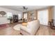 Comfortable living room with neutral tones, a ceiling fan, and an open layout with easy access to the outdoors at 290 Woodland Oak Way, Summerville, SC 29485