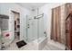 Modern glass shower with white tile, a rain shower head, and a built-in bench at 290 Woodland Oak Way, Summerville, SC 29485
