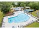 Aerial view showcasing the community pool, tennis courts, and surrounding greenery at 3010 Grinnell St, Johns Island, SC 29455