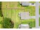 Aerial view of a property with a large, grassy backyard at 3010 Grinnell St, Johns Island, SC 29455