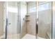 Modern bathroom shower with glass enclosure, tiled walls, and a shower bench at 3010 Grinnell St, Johns Island, SC 29455