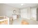 Bright Bedroom features changing table and round mirror at 3010 Grinnell St, Johns Island, SC 29455