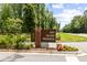 The Sea Island Preserve entrance sign framed by lush greenery and colorful flowers at 3010 Grinnell St, Johns Island, SC 29455