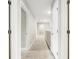 Hallway featuring neutral carpet and walls with white doors leading to various rooms in the house at 3010 Grinnell St, Johns Island, SC 29455