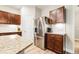 Bright kitchen features stainless steel refrigerator and granite countertops at 3010 Grinnell St, Johns Island, SC 29455