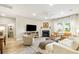 Comfortable living room with fireplace, large TV, and neutral decor at 3010 Grinnell St, Johns Island, SC 29455